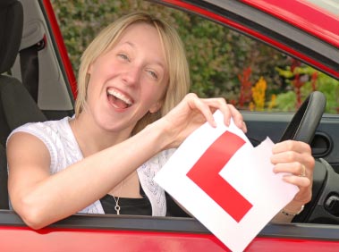 Girl ripping up L plates after having hypnosis for exams